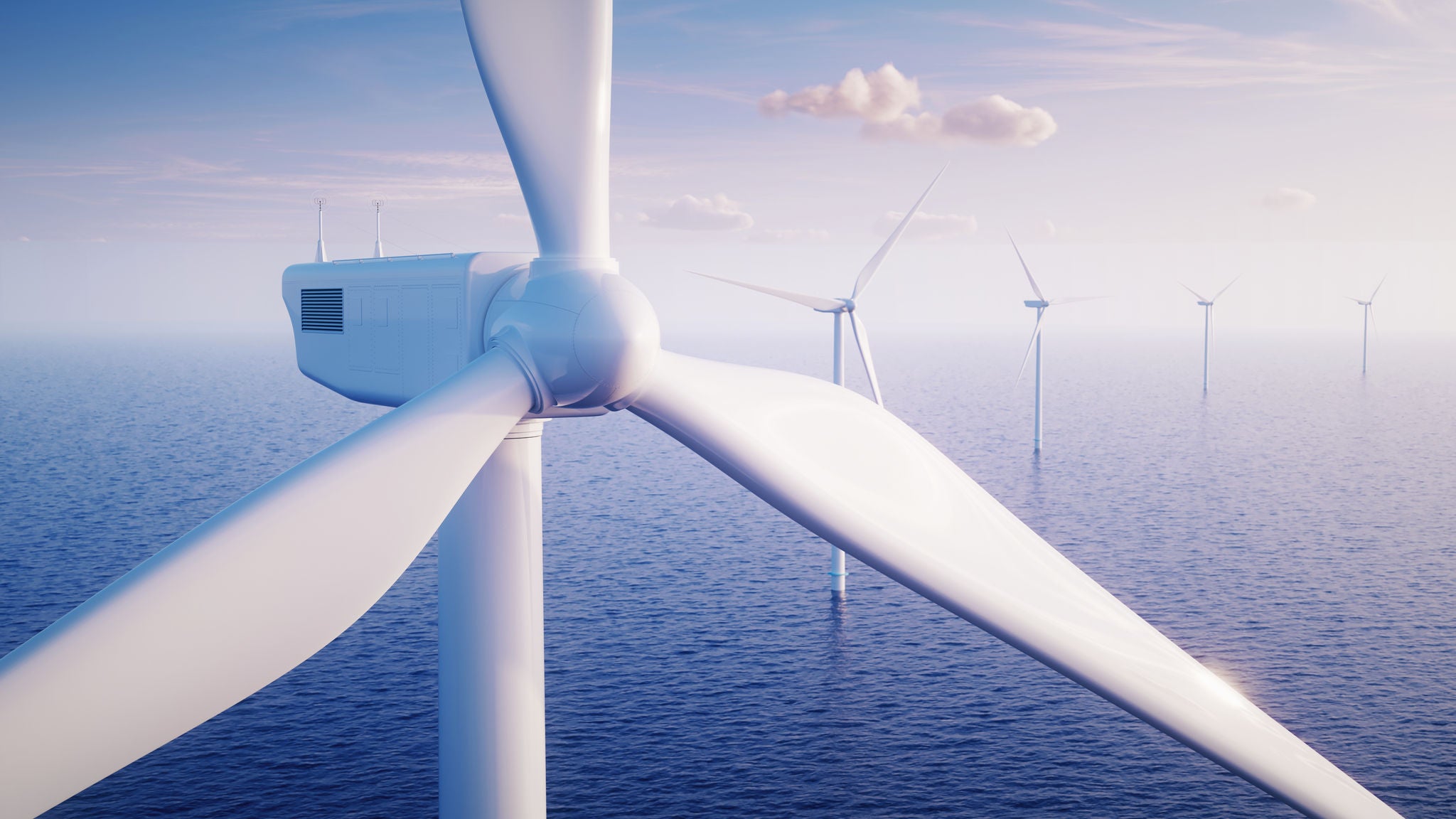 IN_Wind_offshore_Shutterstock_2447206431.jpg Windturbines off shore, wind industry