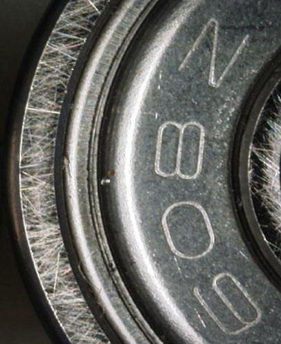 Close-up of a counterfeit bearing